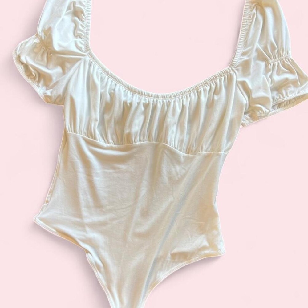 New Never Worn White bodysuit with puffy sleeves